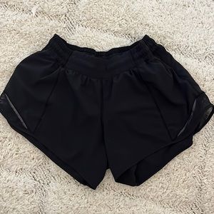 Black lululemon athletica hottie hot shorts 4in